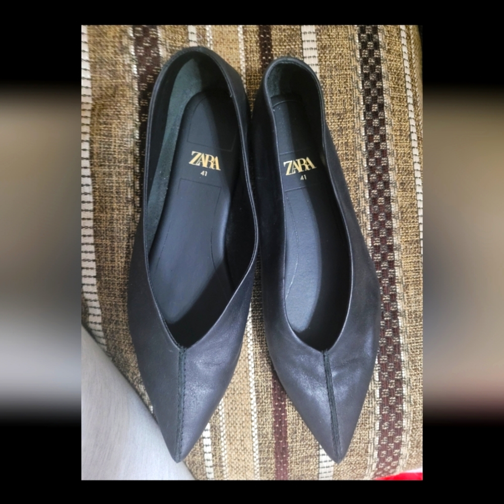 Black leather flats
